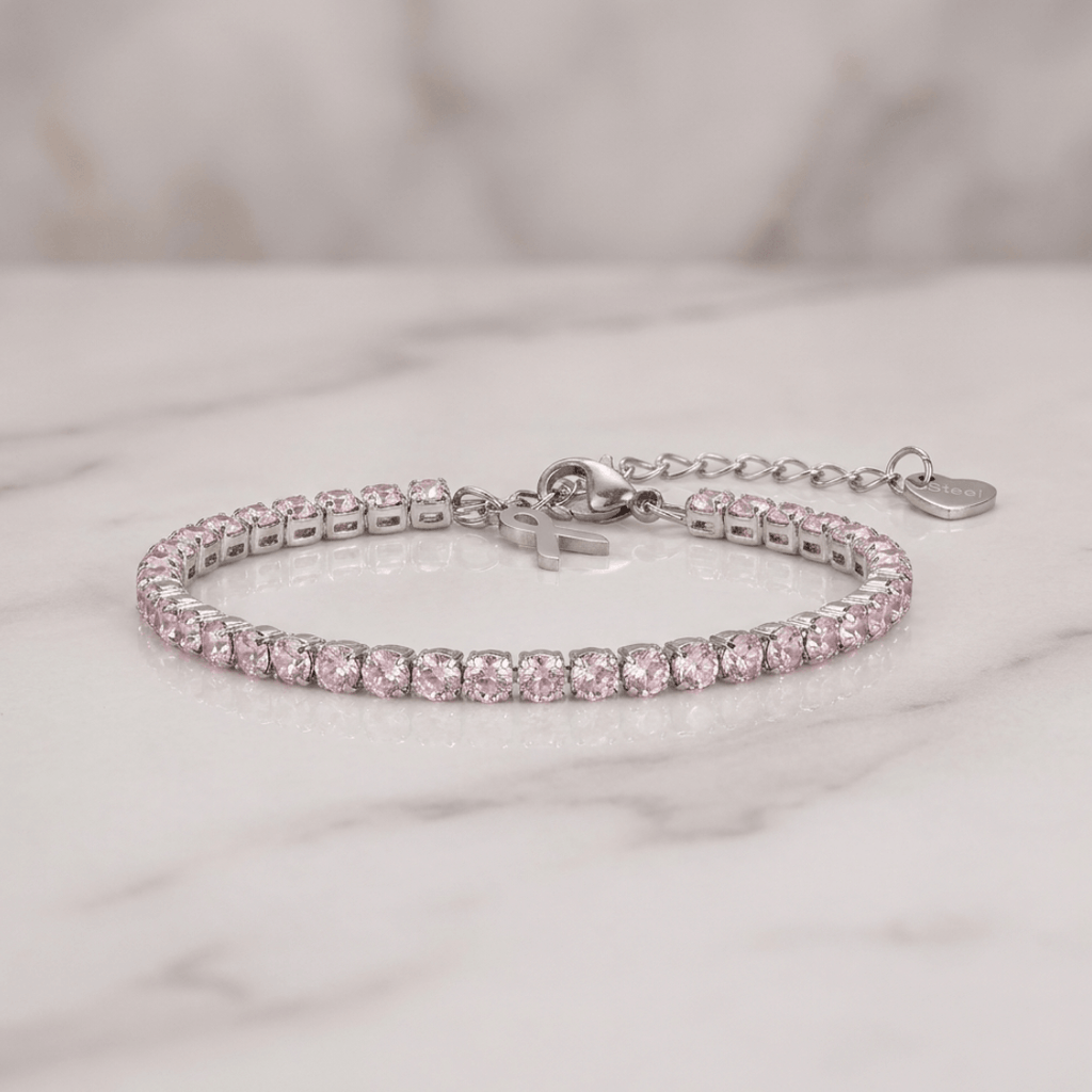 Pulsera tenis circonitas rosas bañada en plata sobre mármol, colgante lazo solidario, cadena ajustable