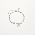 Pulsera Bambú de color plata con eslabones de estilo bambú, perla artificial, colgante de corazón y cadena de extensión.